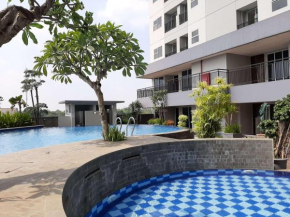 Good and Homey 2BR at Parkland Avenue Apartment By Travelio